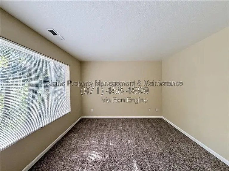 5758 NE Damsel Dr — Photo 29