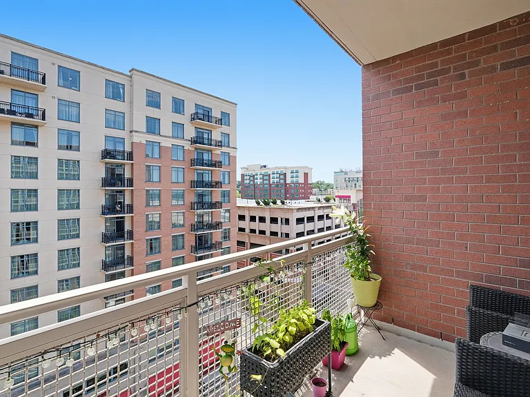 Additional balcony view showcasing the surrounding cityscape