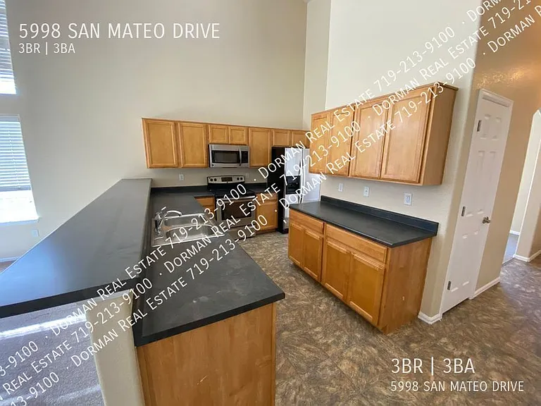 5998 San Mateo Dr — Photo 2