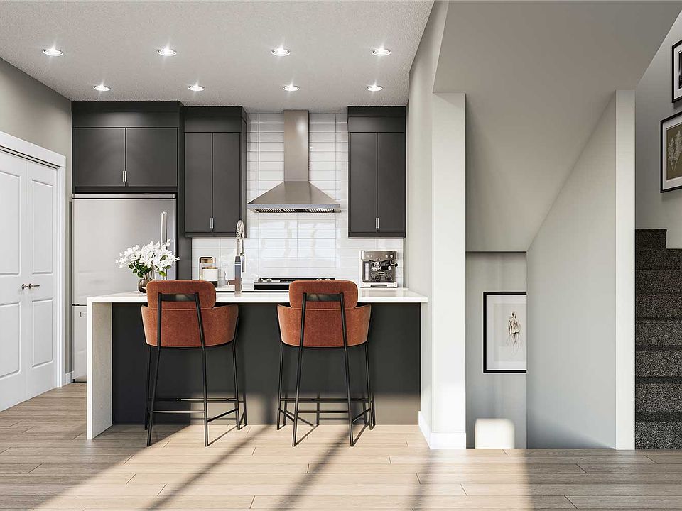 A rendering of the kitchen of the Mahattan model in Crown Park by Brookfield Residential
