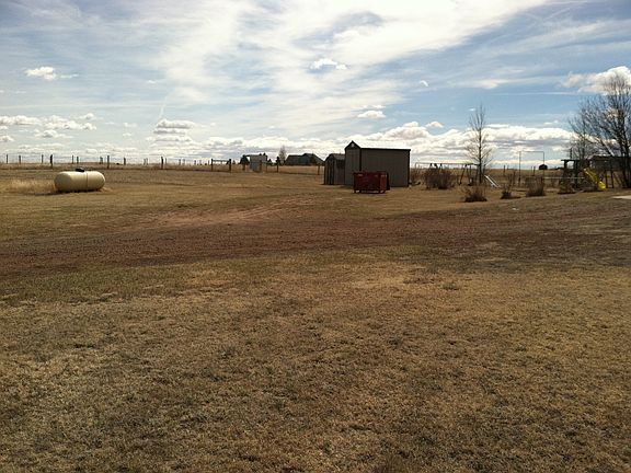 2 out buildings, partial backyard