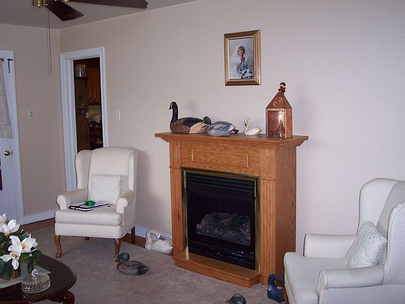 Hardwood floors and gas fireplace in Livinig room