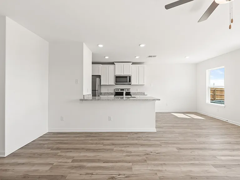 The kitchen overlooks the family room.