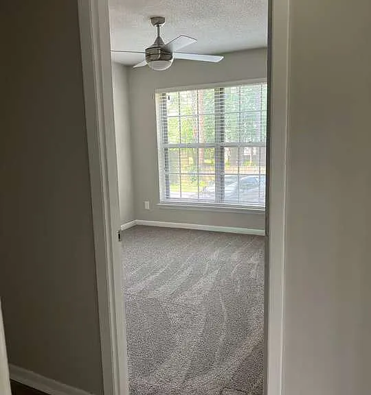 Step into a serene living space at Arbor Terrace, featuring large windows that bathe the room in natural light and modern finishes throughout. Your ideal sanctuary awaits. Schedule a tour today to envision your new home!
