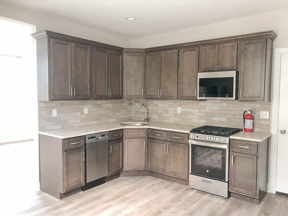 Spacious Kitchen with Stainless Steel Appliances
