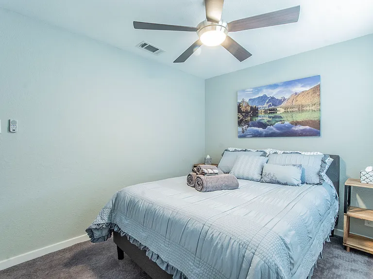Second furnished room with full-size bed