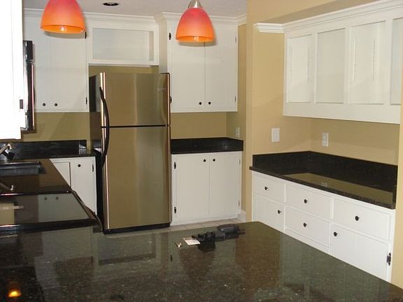 Lots of cabinets and workspace