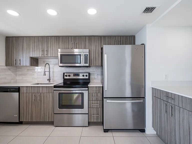 Spacious kitchen with a pantry and granite countertops