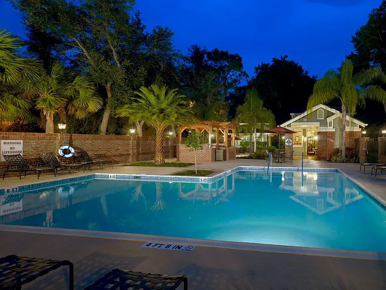 Resort-style pool at dusk
