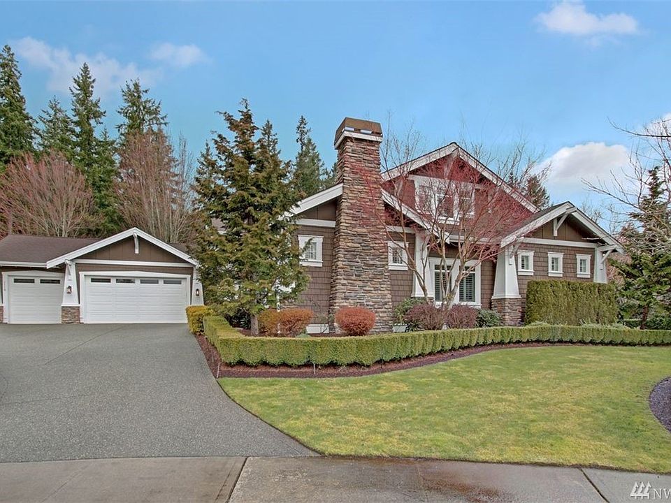 For those with elevated standards looking for a beautiful home with custom quality fit and finishes, this 4120* sq ft home does not disappointment! Not the standard builders track home, this 4 bedroom, 3 full bath luxury built home has been impeccably maintained. Featuring a main floor owner's retreat, a great room with extensive built-ins and soaring timber beamed ceiling and main floor guest bedroom with adjacent full bathroom. Located in Cedar Cove in Sammamish in a verdant, underpopulated area of the Plateau, this lovey home rest on a 1/3rd of an acre in a quiet cul-de-sac that backs to open space. 