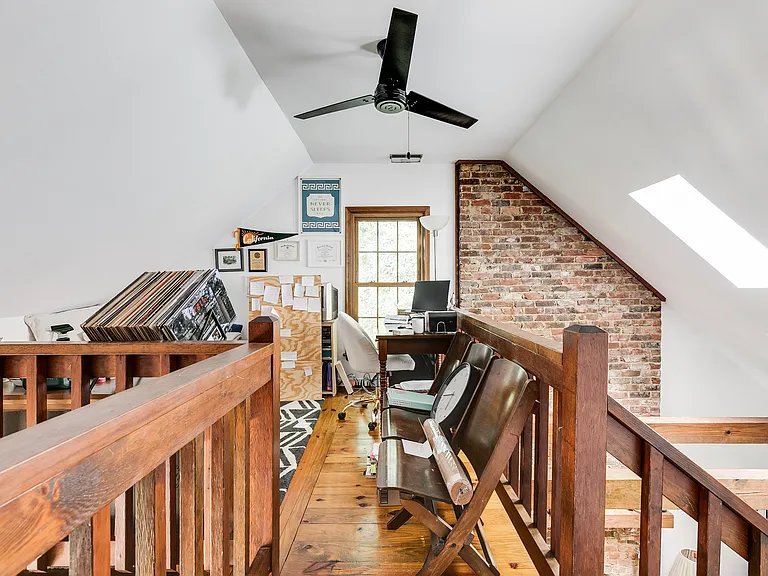 Open loft with ceiling fan