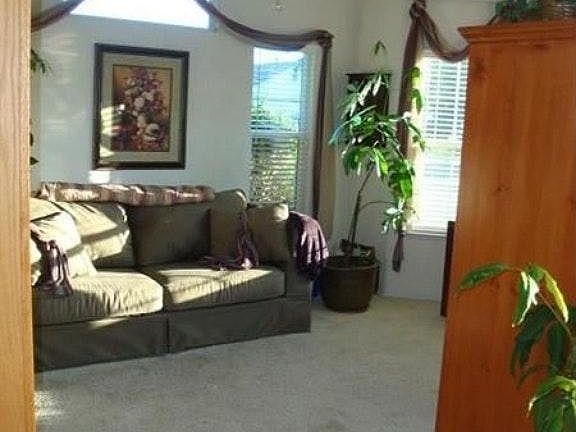 Living room to the righ on front door