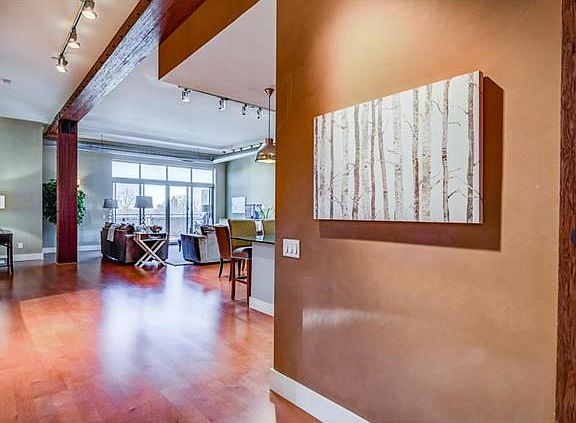 First glimpse from the entry foyer into the main living area of the unit showing the wonderful open floor plan