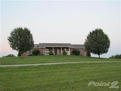 Beautiful Brick Ranch with very private setting and gorgeous views.  Solid wood trim and doors throughout, Ceramic tile kitchen and bathrooms cathedral ceilings, finished lower level, new carpet.