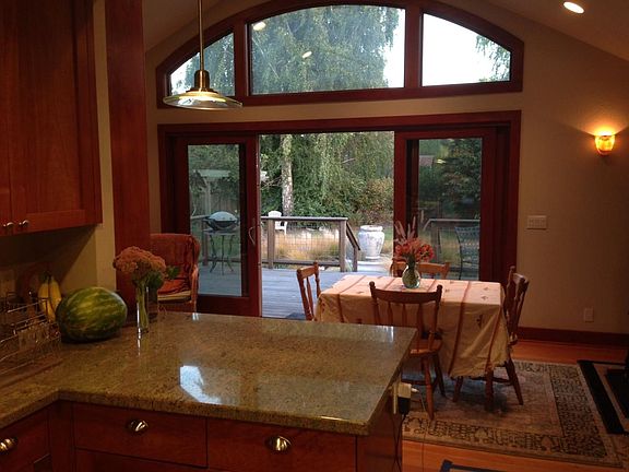 Kitchen View into family room and back yard