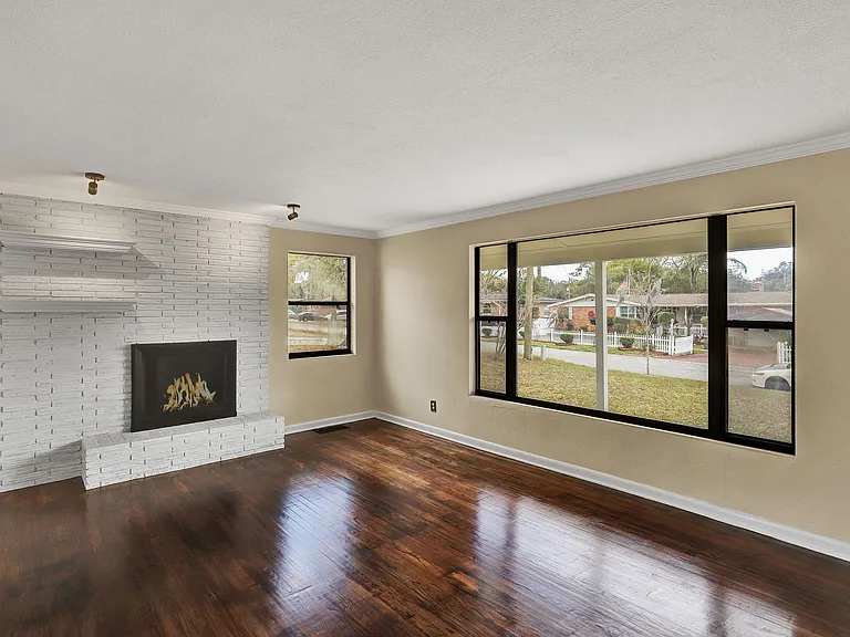 Living Room with Wood Burning Fireplace