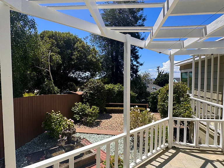 Layered outdoor spaces connect the atrium, fountain garden, and other levels surrounding landscaping in a relaxed, inviting setting.
