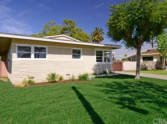 Trees and landscaping make a home look more welcoming.   Once here, you won't want to leave.