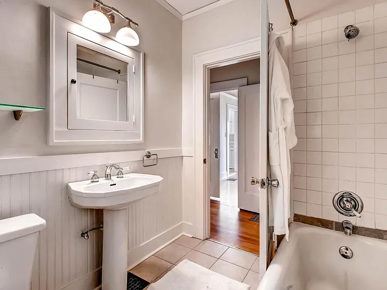 Primp in Large 1920's Restored Bathroom on Main Level With O
