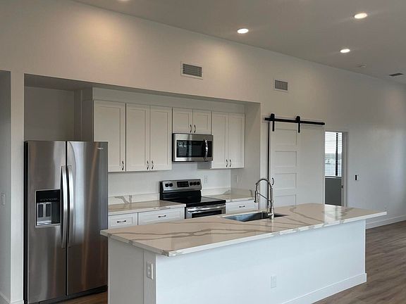 4th image of 12310 W ELWOOD Street