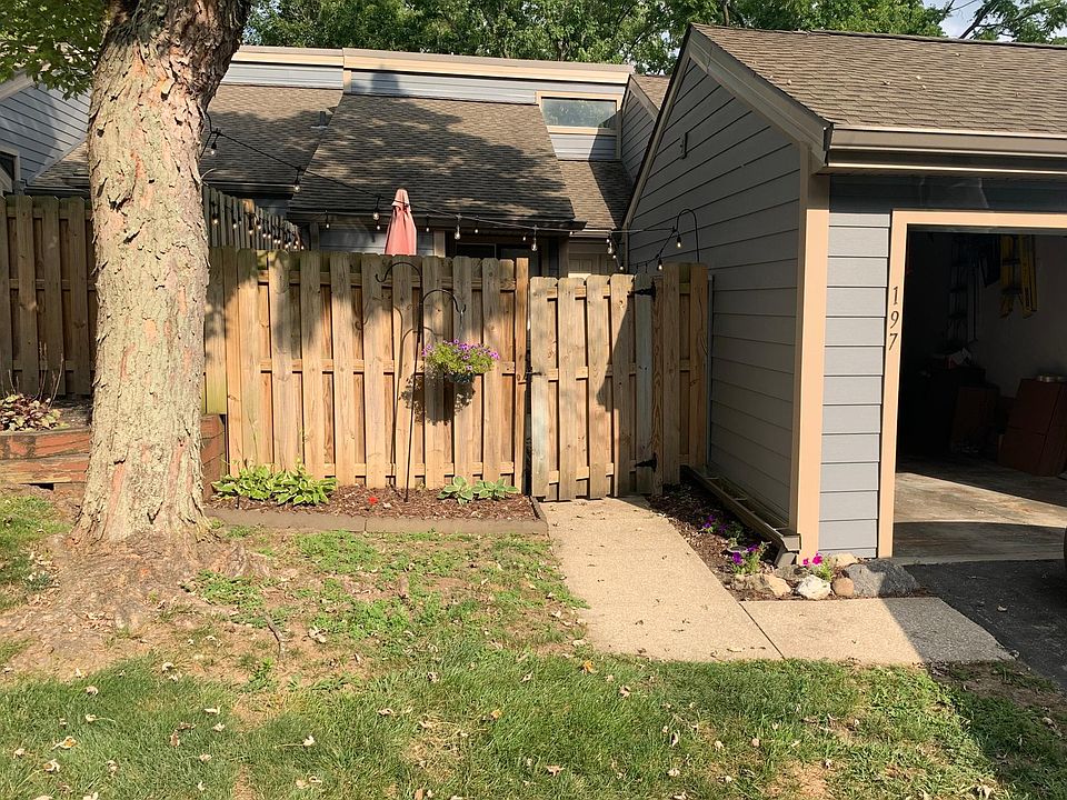 Gated front entrance attached to garage