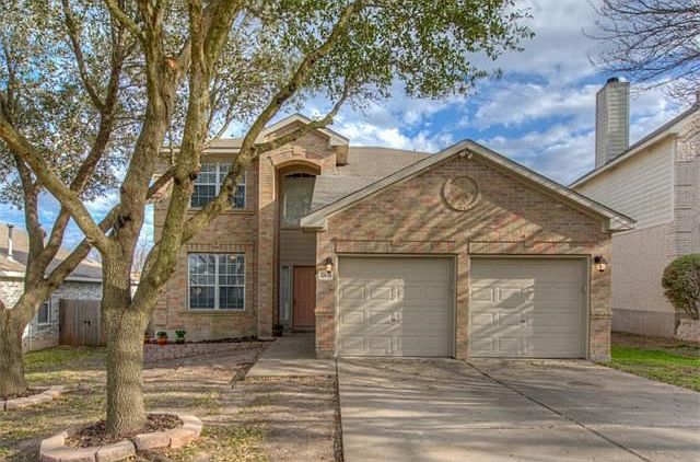 Welcome to your new home! Mature trees and 3 side masonry.