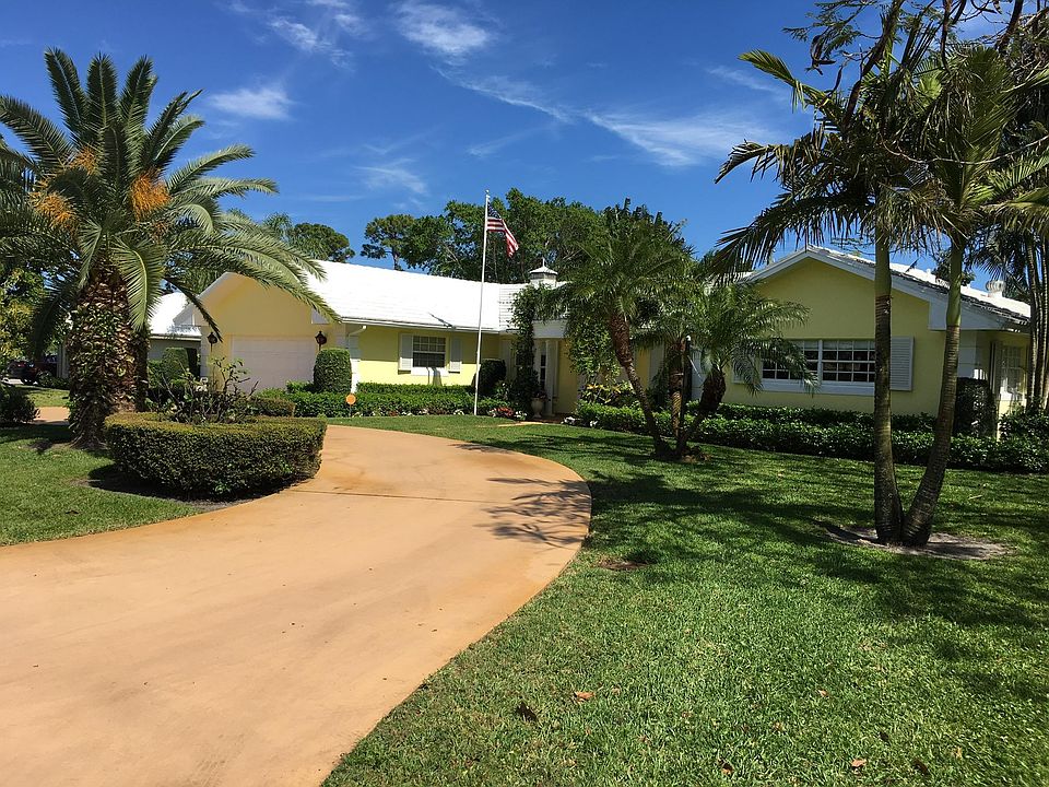 Approach from circular drive to double door entry.