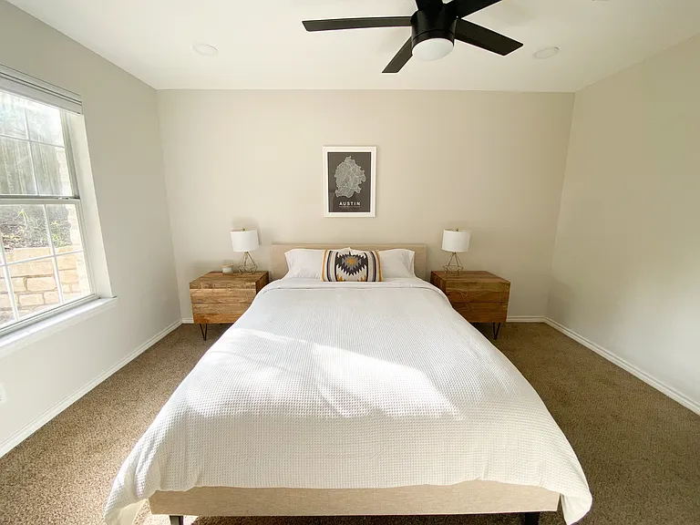 Downstairs Primary Bedroom w/ walk-in closet