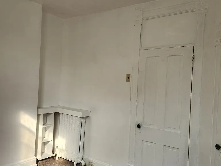 113 E 3rd St — Photo 5