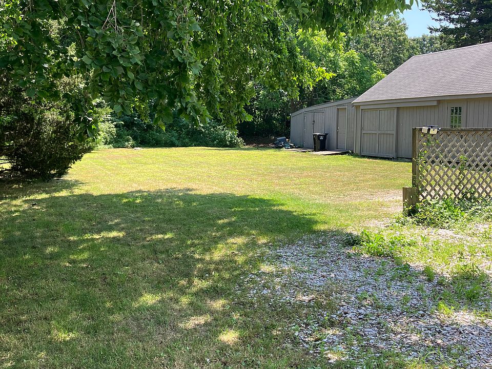 backyard with storage units to the right