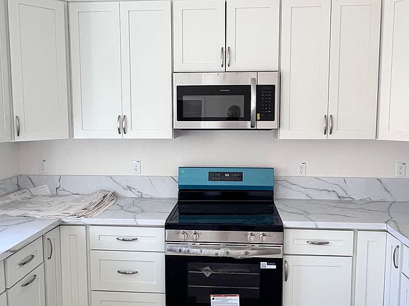 All new cabinets, countertops, and stainless steel appliances
