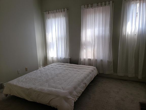 Bedroom with queen size bed.