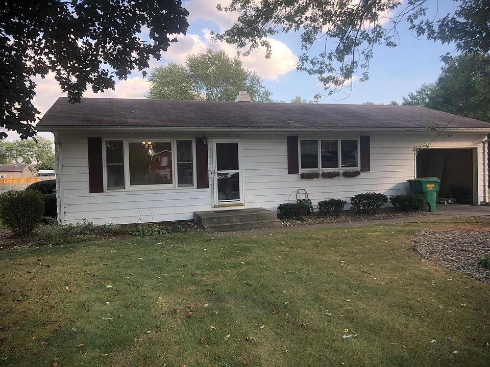 Front yard with 2 mature shade trees.