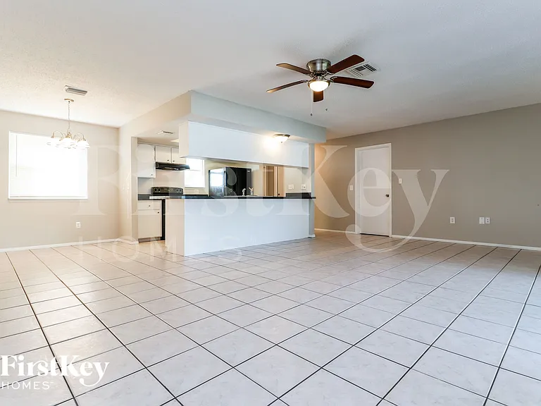 7704 Riverdale Dr — Photo 3
