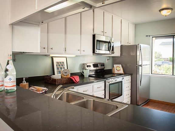 Breakfast bar opening to kitchen