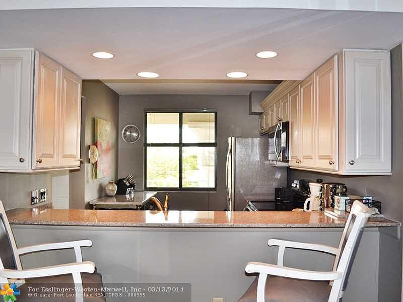 Dual Balcony Penthouse Unit Overlooking Pond and Pool