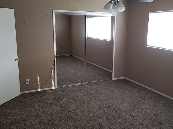 Master Bedroom - with walk in closet; new paint, carpet, ceiling fan and blinds