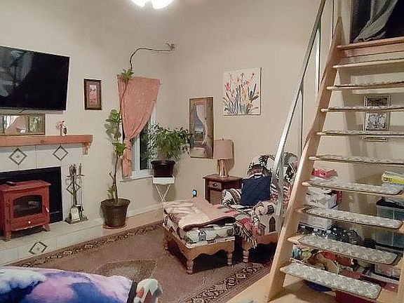 Living Room. Wood Fireplace.