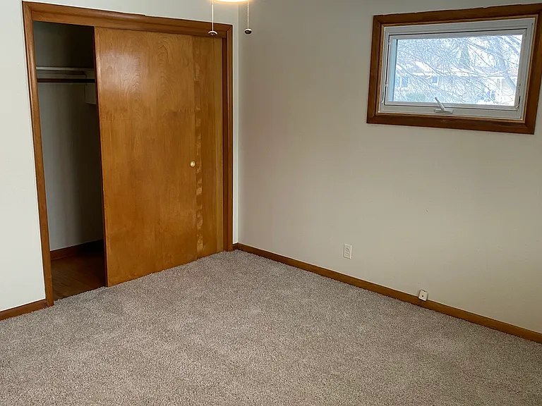Main Bedroom Showing Closet Doors