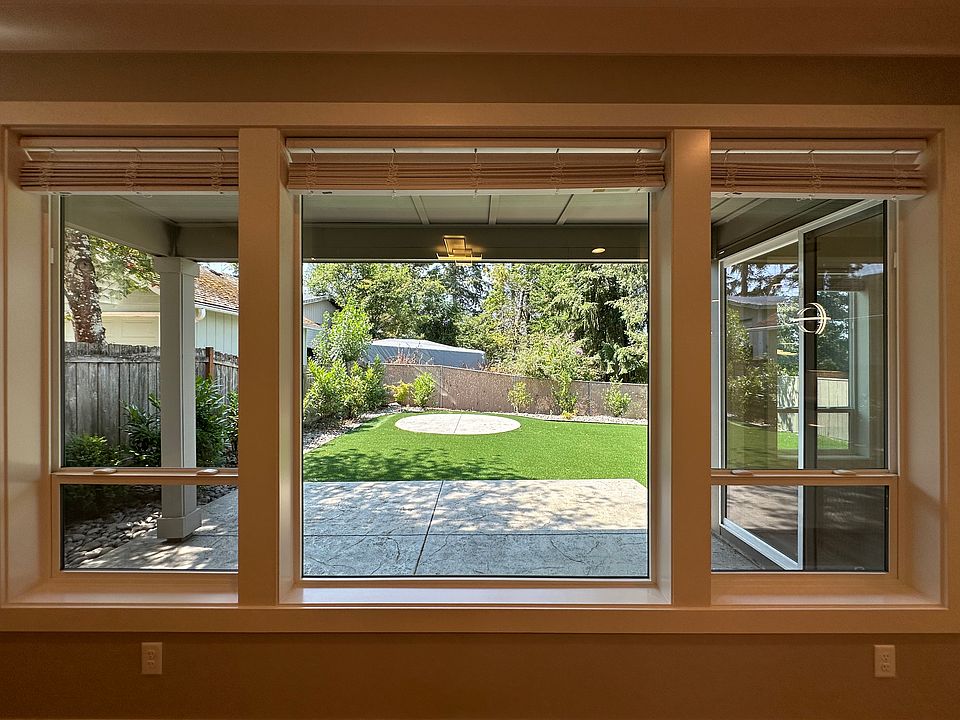 View of the covered patio and backyard from the living room