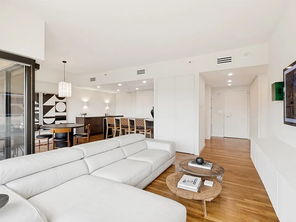 The supple leather of the over-sized sofa and chaise begs you to make yourself comfortable.