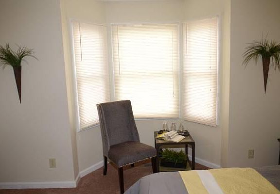 Master bedroom with bay windows