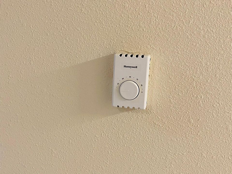 Wall thermometer in each room