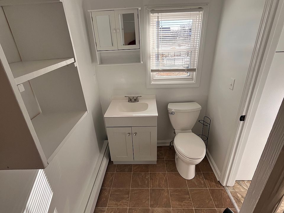 Bathroom w/ brand new vanity and shelves