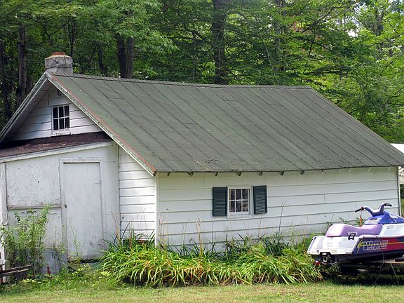 Large garage with work shop and wood stove