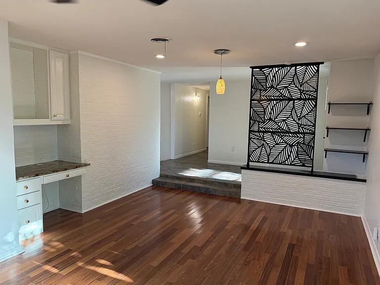 Front living/dining area with built-in desk