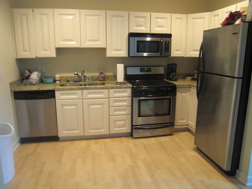 Kitchen with stainless steel appliances, granite counters