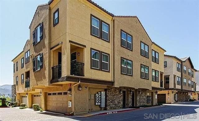 Tri-level townhome built in 2017 - garage/entry level, main level (living, dining, half bath, kitchen, half bath) and 3rd level w/ two bedrooms with own baths.