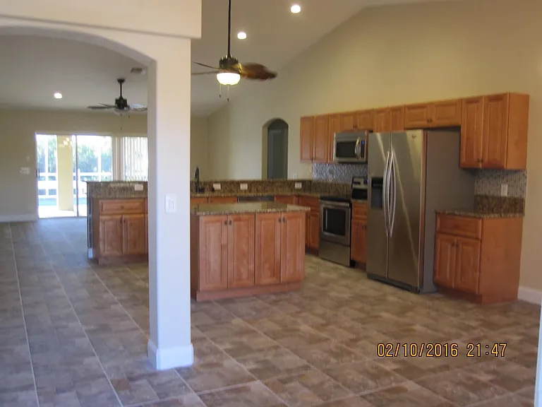 Open Floor Plan with Tile & Granite