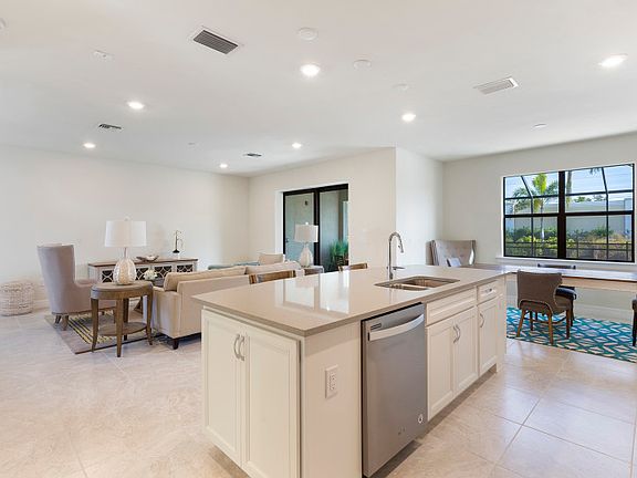 Large kitchen island with views into gathering room
